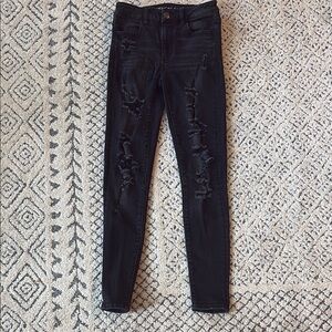 American Eagle Women's size 2 super super stretch Black Distressed Jeans
